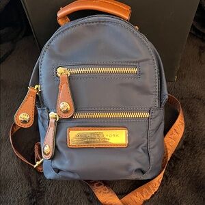 Compact Navy and Tan Men's Mini Backpack